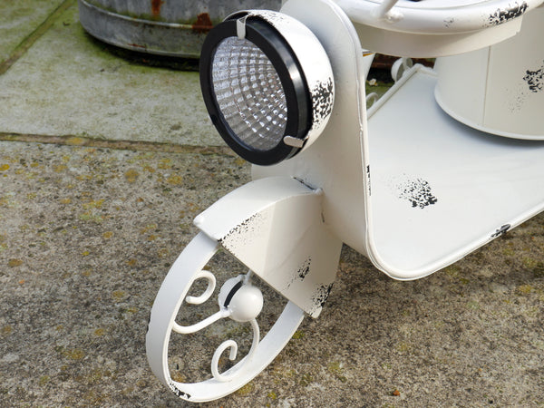 Vintage Style Scooter shape metal planter with light up solar headlight, distressed white finish