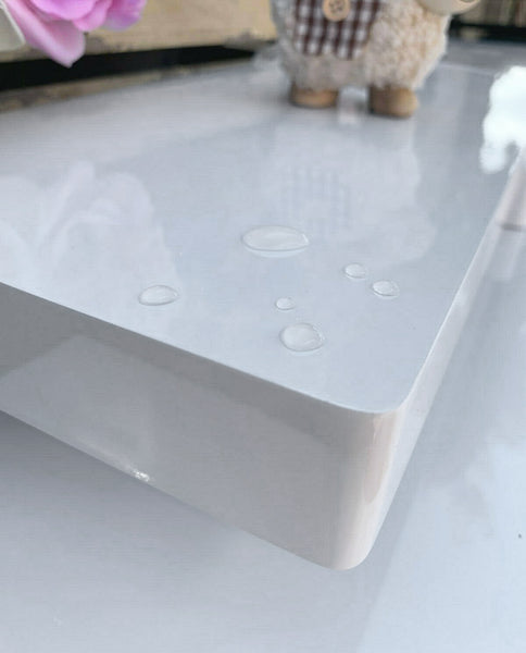 30cm long high gloss float shelf. It sticks out 20cm from the wall and has rounded corners. The shelf has a thickness of 3.8cm, colour white.
